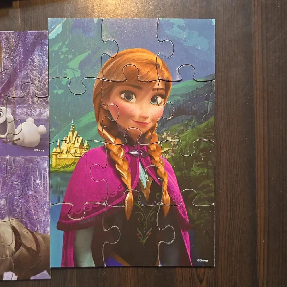 5 Disney Frozen Puzzles in Wooden Storage Bin